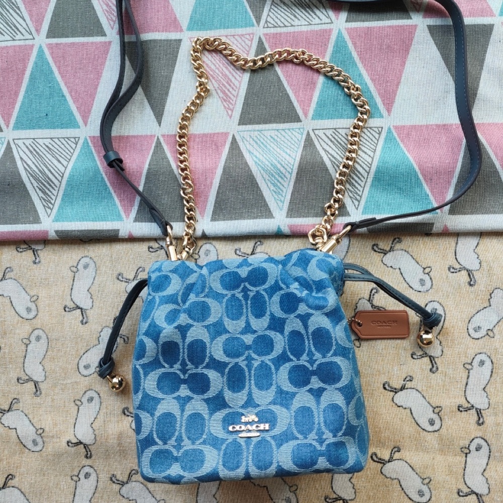 Coach Blue Signature Denim Drawstring Crossbody with Gold Chain Accent